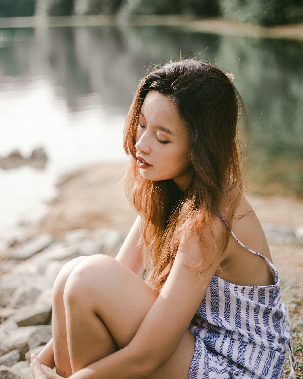 long hair, contemplation, sunlight, beauty, young adult, one person, beach, young women, beautiful woman, portrait, only women, adults only, adult, people, outdoors, one woman only, one young woman only, sand, nature, day, water, freckle, close-up