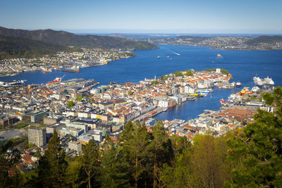 High angle view of townscape by sea