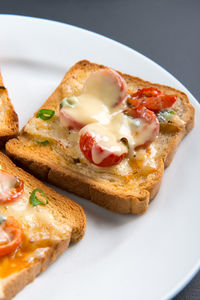 Close-up of breakfast served in plate