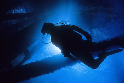 Scuba diver on the oil platform grace, near santa barbara, ca