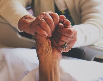 Close-up of man holding hands