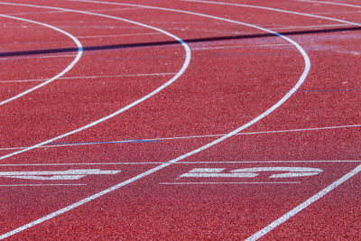 High angle view of numbers on running track in stadium