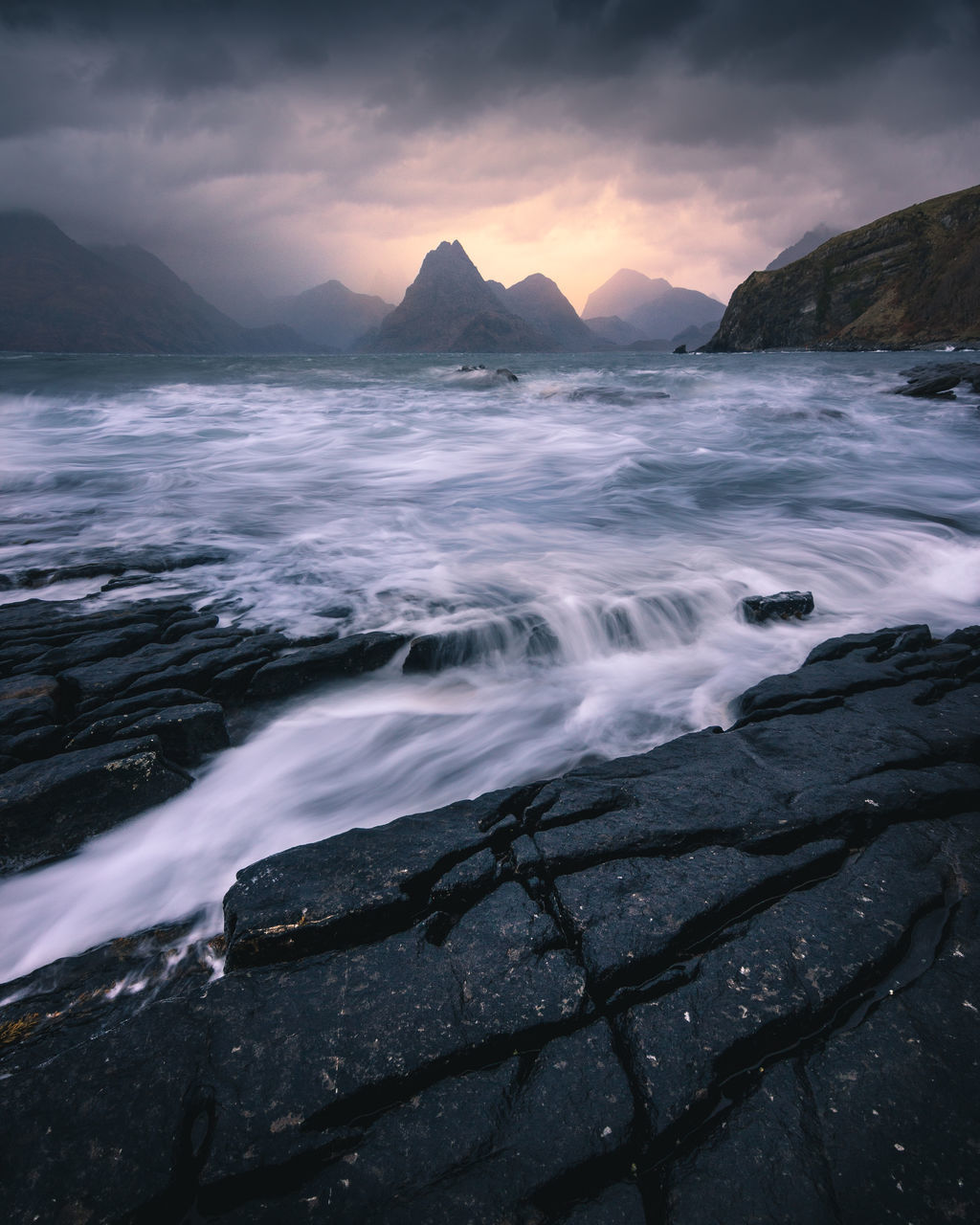 water, beauty in nature, sky, scenics - nature, nature, cloud - sky, no people, sunset, mountain, solid, motion, rock, sea, tranquility, tranquil scene, rock - object, land, idyllic, outdoors, flowing water