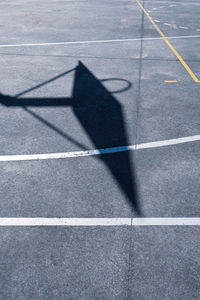 Silhouette on the street basket court