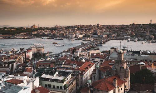 High angle view of townscape against sky at sunset