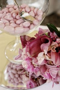 Close-up of hand holding rose bouquet