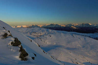 Scenic view of mountains against sky during winter