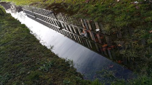 High angle view of dam by canal