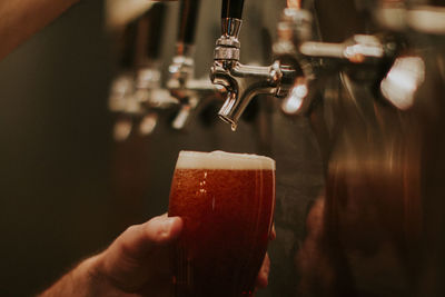 Beer tap pouring beer