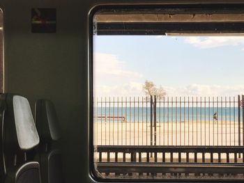 Empty seats by window in train