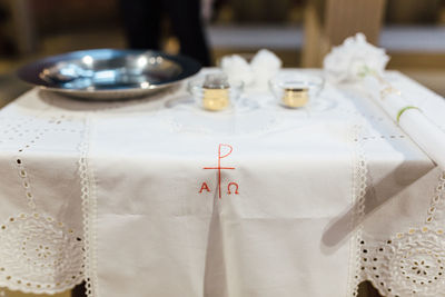 Close-up of text on white table