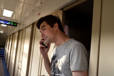 Young man smoking cigarette