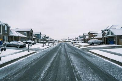 Empty road against sky