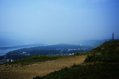 Scenic view of landscape against sky at night