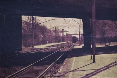 Railroad station platform seen through window