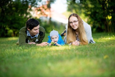 Full length of father and daughter in park