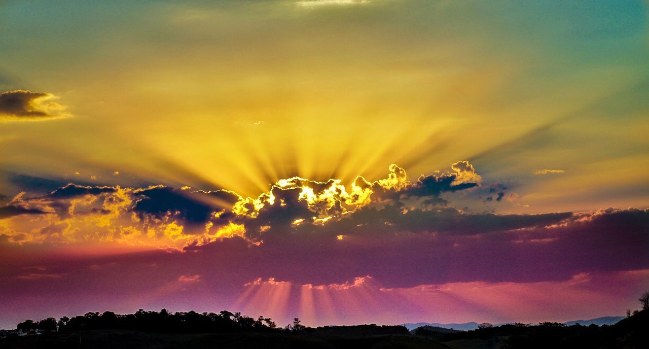 sunset, orange color, sky, beauty in nature, scenics, tranquil scene, cloud - sky, nature, tranquility, idyllic, silhouette, yellow, landscape, dramatic sky, outdoors, mountain, sun, no people, non-urban scene, cloud