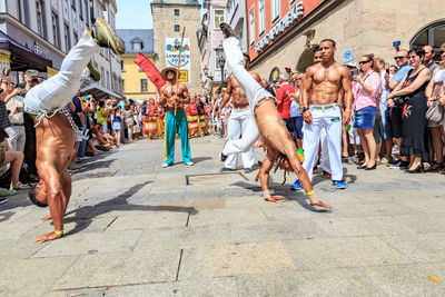 Full length of people on street in city