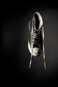 High angle view of shoes against black background