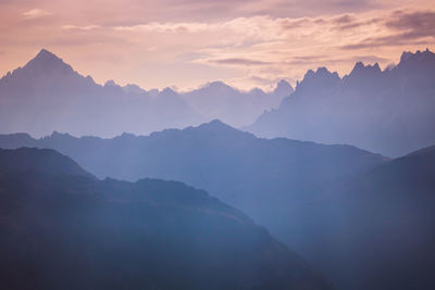 Scenic view of mountains against sky during sunset