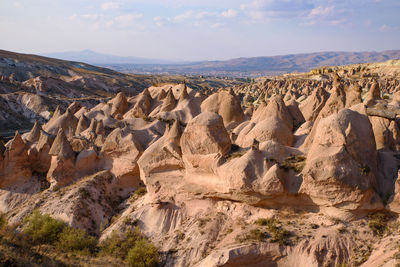 Panoramic view of rocky mountains against sky