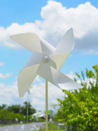 Close-up of white toy against sky