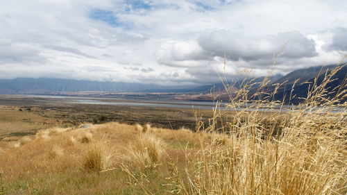 Scenic view of land against sky