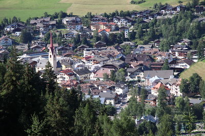 High angle view of townscape and trees in town