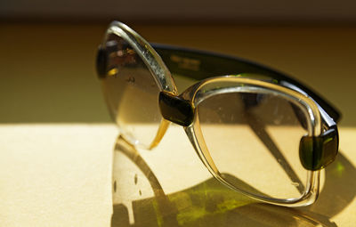 Close-up of sunglasses on table