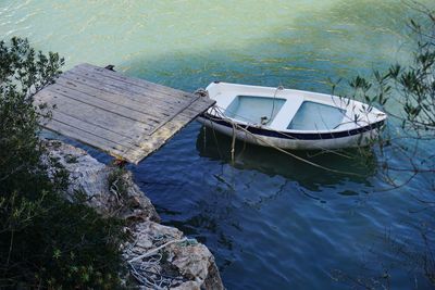 High angle view of abandoned boat moored at lake