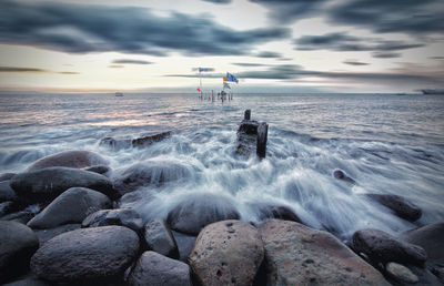 Scenic view of sea against sky during sunset