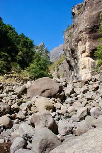 Rock formations on landscape against clear sky