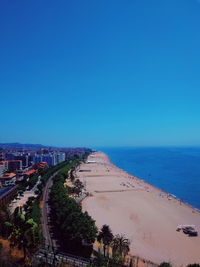 High angle view of beach against clear blue sky
