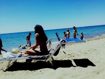 Scenic view of beach against clear sky