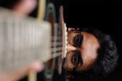 Close-up of man with guitar 