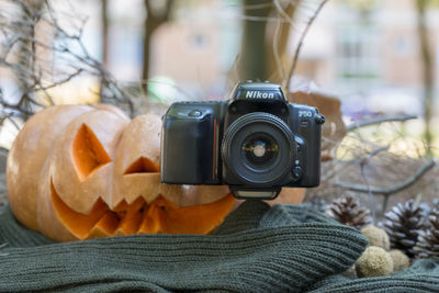 Close-up of person photographing camera