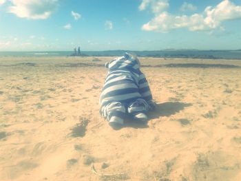 Scenic view of beach against sky