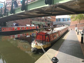 Train in boat against buildings