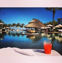 Lounge chairs and swimming pool at beach