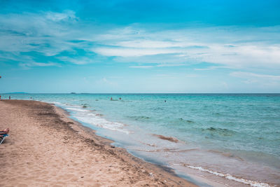 Scenic view of beach against sky