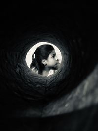 Portrait of boy in tunnel