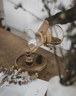 Close-up of wine glasses on table