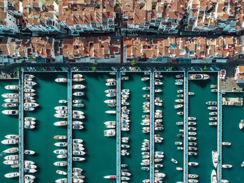 Drone shot of the high-end shopping area and marina puerto banús in the south of spain.