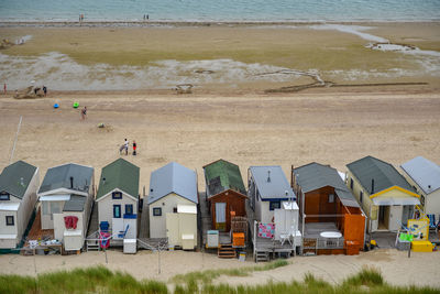 Beach huts by sea