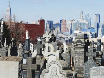 View of cemetery with buildings in background