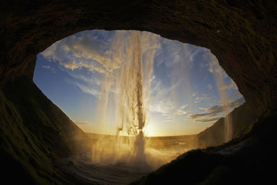 Looking out from behind the waterfall seljalandsfoss