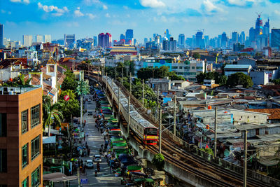 High angle view of street amidst buildings in city