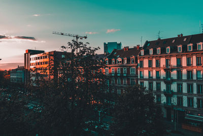 High angle view of city during sunset