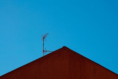 Low angle view of building against blue sky