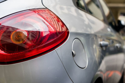 Reflection of car on side-view mirror